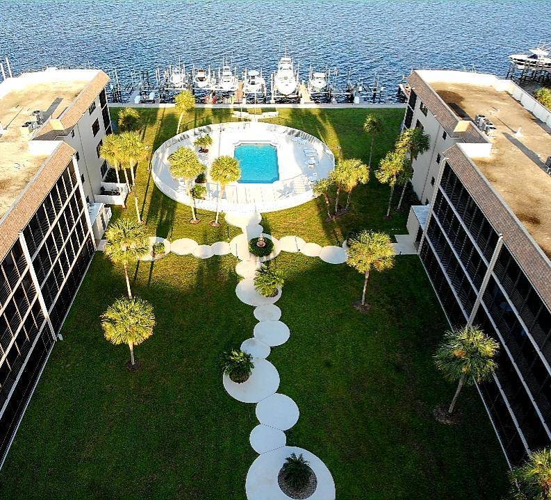 BIG price reduction.. Beautiful Intracoastall community, ground floor garden view with large screened lanai.