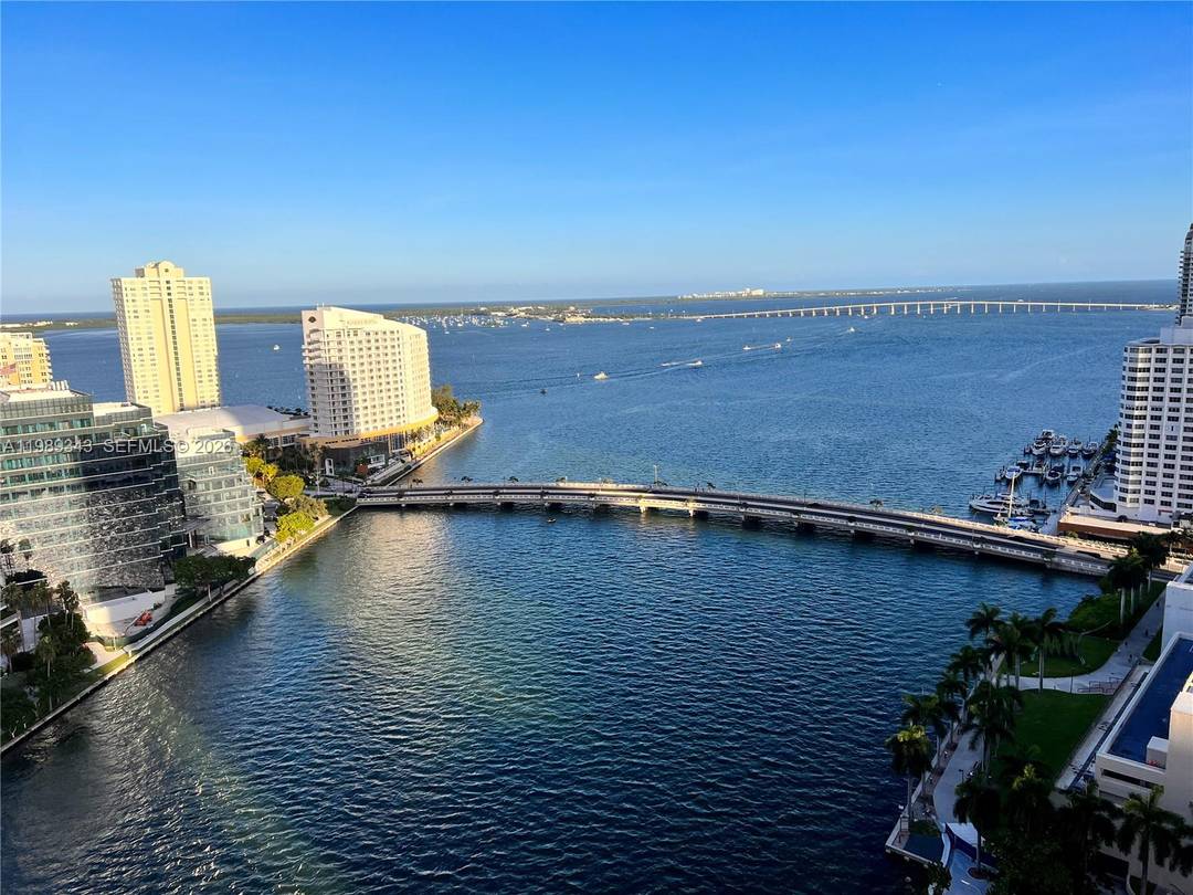 Enjoy stunning Direct Unobstructed water views from this 3 2 corner unit with Carbonized bamboo floors throughout NO CARPET, open Italian kitchen, S.