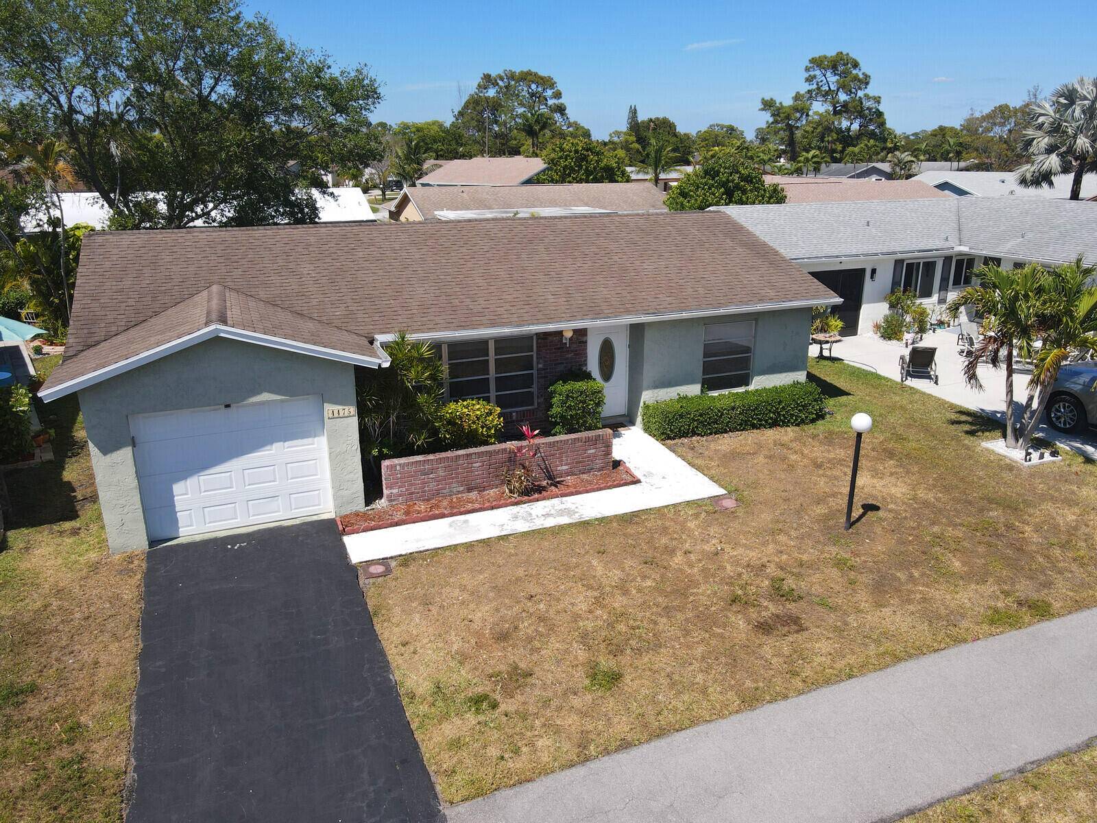 Single Family house in 55 Pet Friendly Community, Low HOA feesThe primary bedroom includes a walk in closet and en suite bath.
