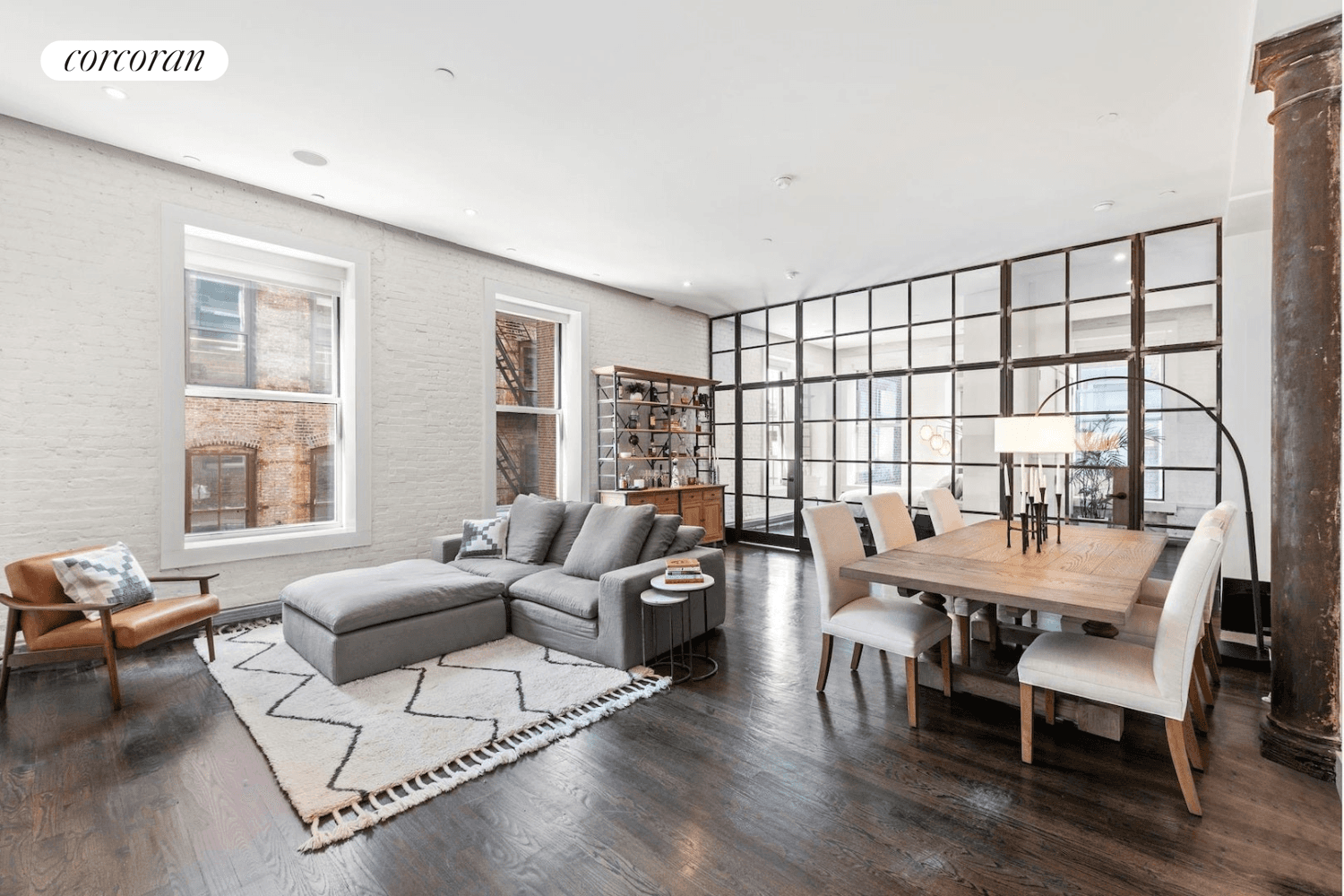 Located on a cobbled stoned street and surrounded by the best shops in the world, this corner Soho loft features seven oversized windows, 11 foot ceilings, four closets, three cast ...