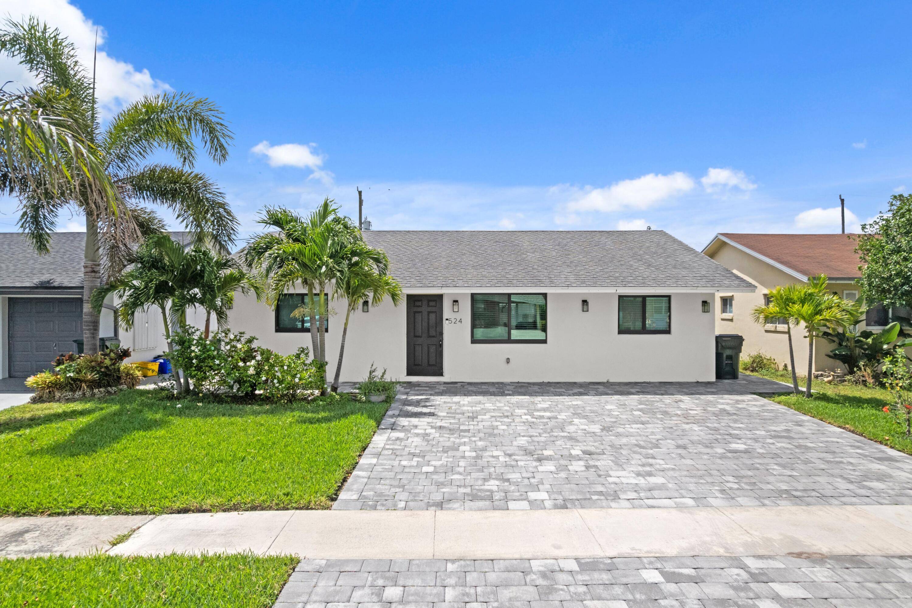 ABSOLUTELY GORGEOUS RENOVATED SINGLE FAMILY HOME PRIME EAST BOCA RATON LOCATION No HOA Fees Bike to Beach All Hurricane Impact Windows Doors Spacious Split Floor Plan Volume Ceilings LED Recessed ...
