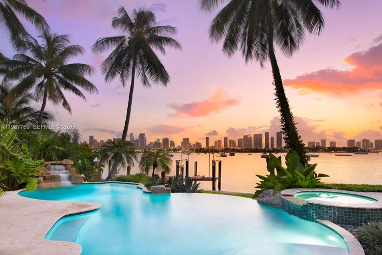 This one of a kind Mediterranean estate is located on one of the most sought after plots on Hibiscus Island.