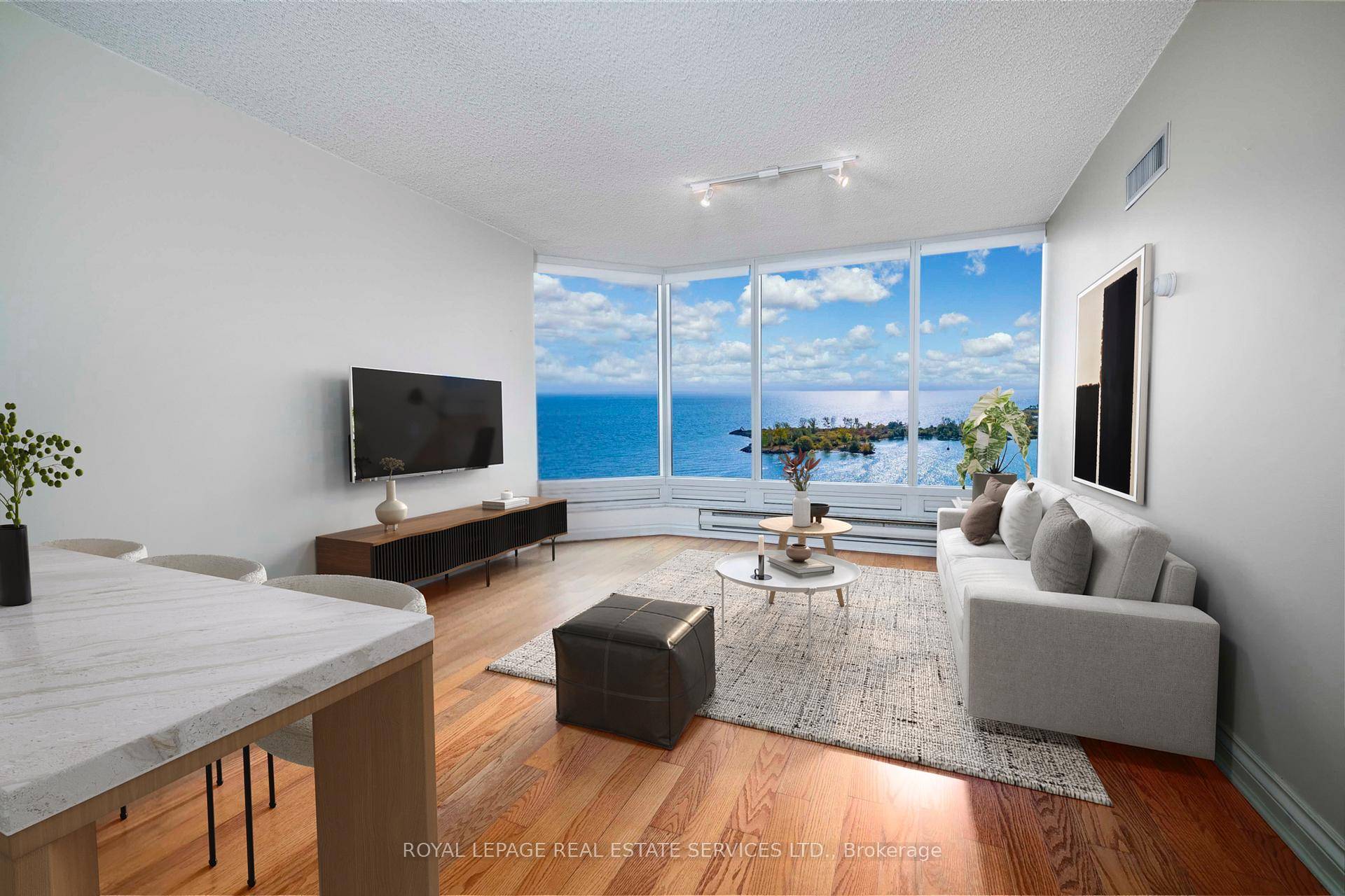 Suite 2104 is a stunning condominium residence, with approximately 790 square feet of living space and the most enchanting view of Lake Ontario.