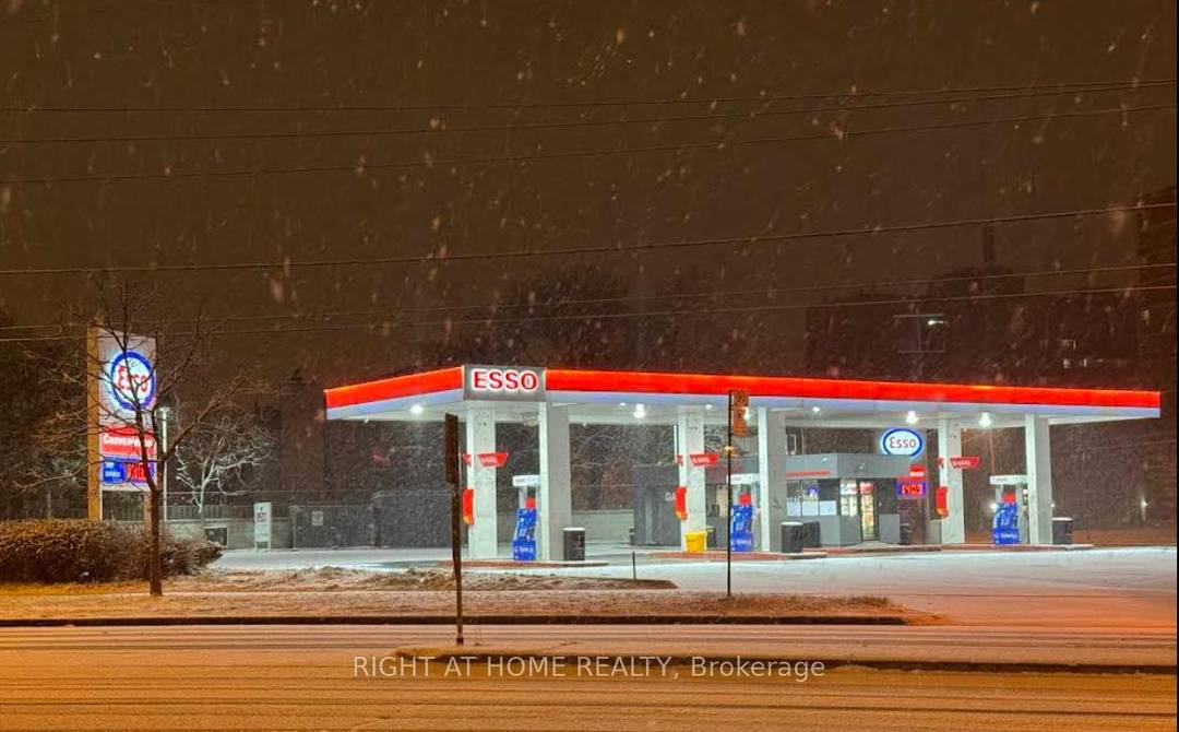 ESSO branded gas station and C store facility on a corner 0.