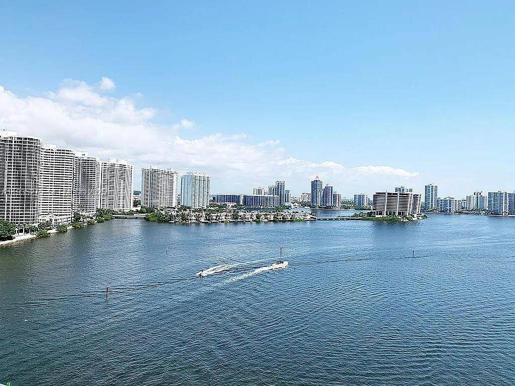 Welcome to your dream waterfront condo at 301 174th St 1818 in Sunny Isles Beach, FL.