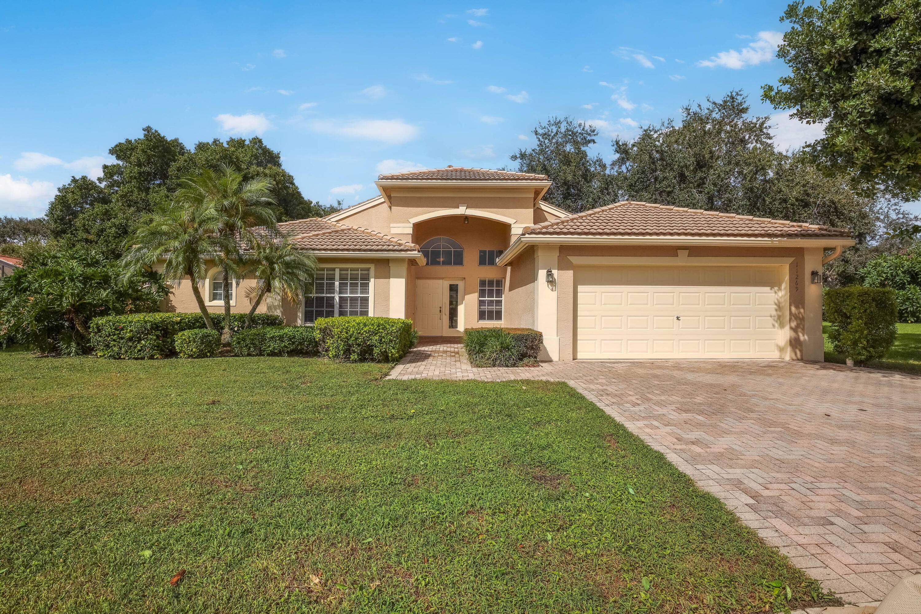 This fabulous PALMA model secluded in the trees is about as close as you can get to the main clubhouse, pools, pickelball, tennis, bistro and all the other clubhouse activiites ...