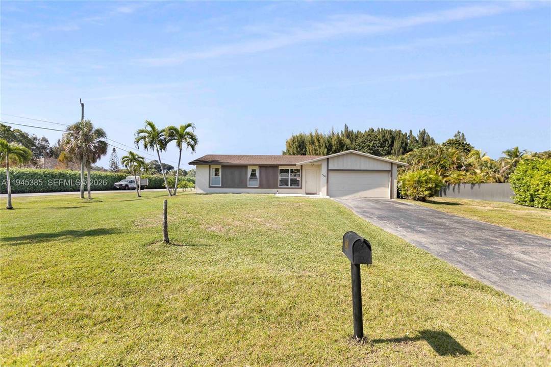 EXQUISITE CUSTOM HOME in The Agricultural Estate District of Southwest Ranches.