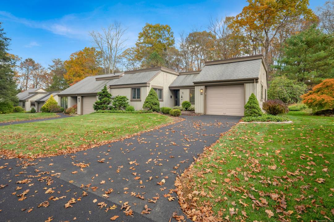 Tucked away in a community is a pristine end unit one level living litchfield style ranch home.