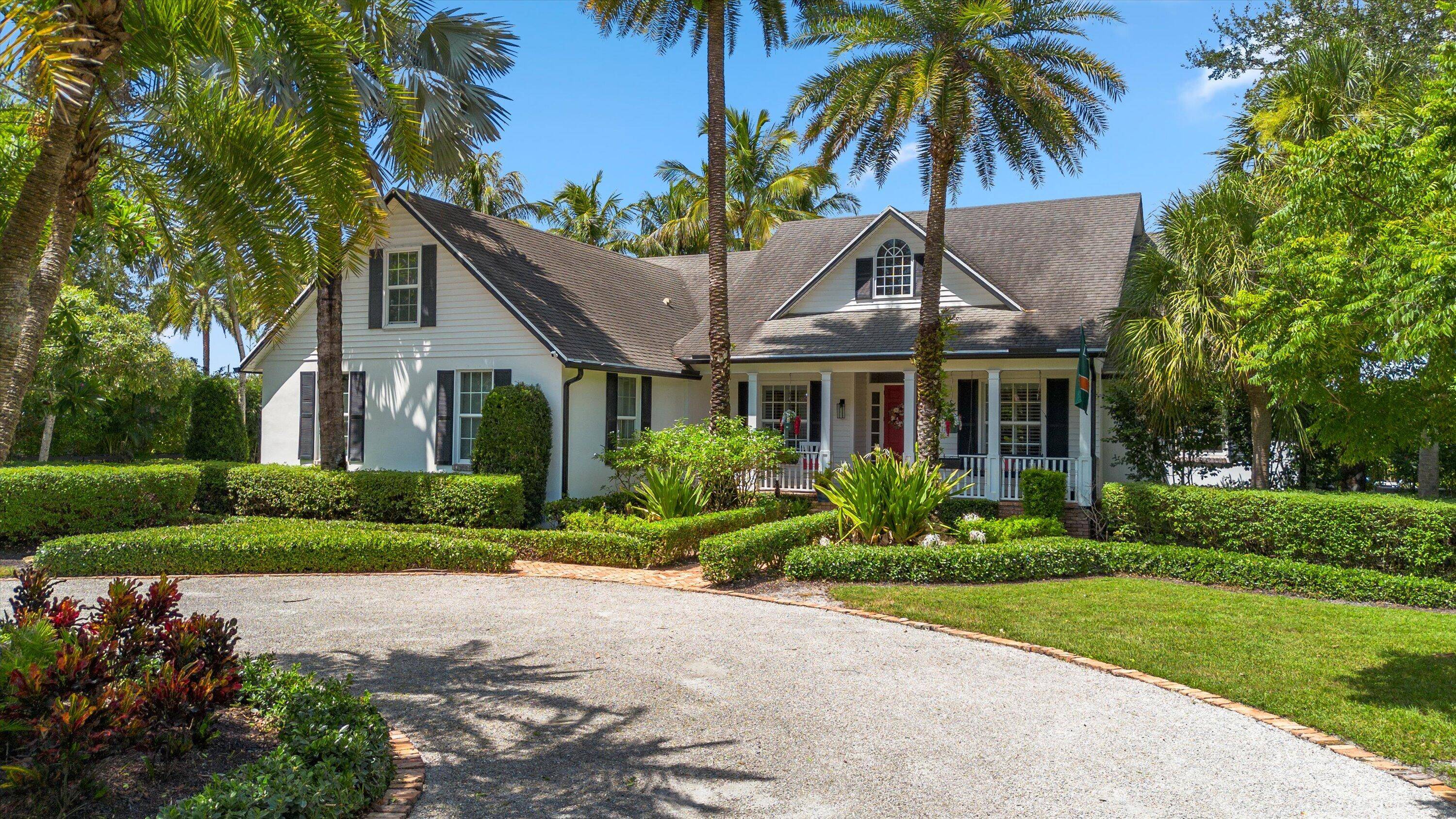Discover this one of a kind residence, perfectly positioned on nearly 2 private, fully fenced acres in the highly sought after Paddock Park neighborhood just minutes from all equestrian venues.