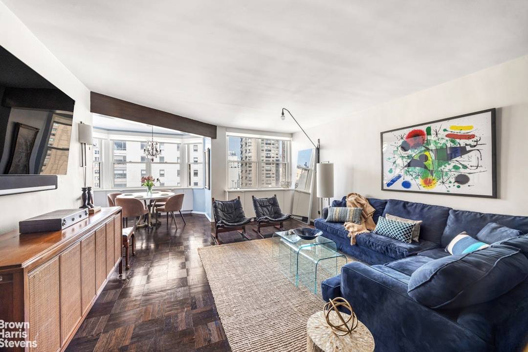 Residence 12C at The Townsend House is a rarely available, sun drenched two bedroom, 2.