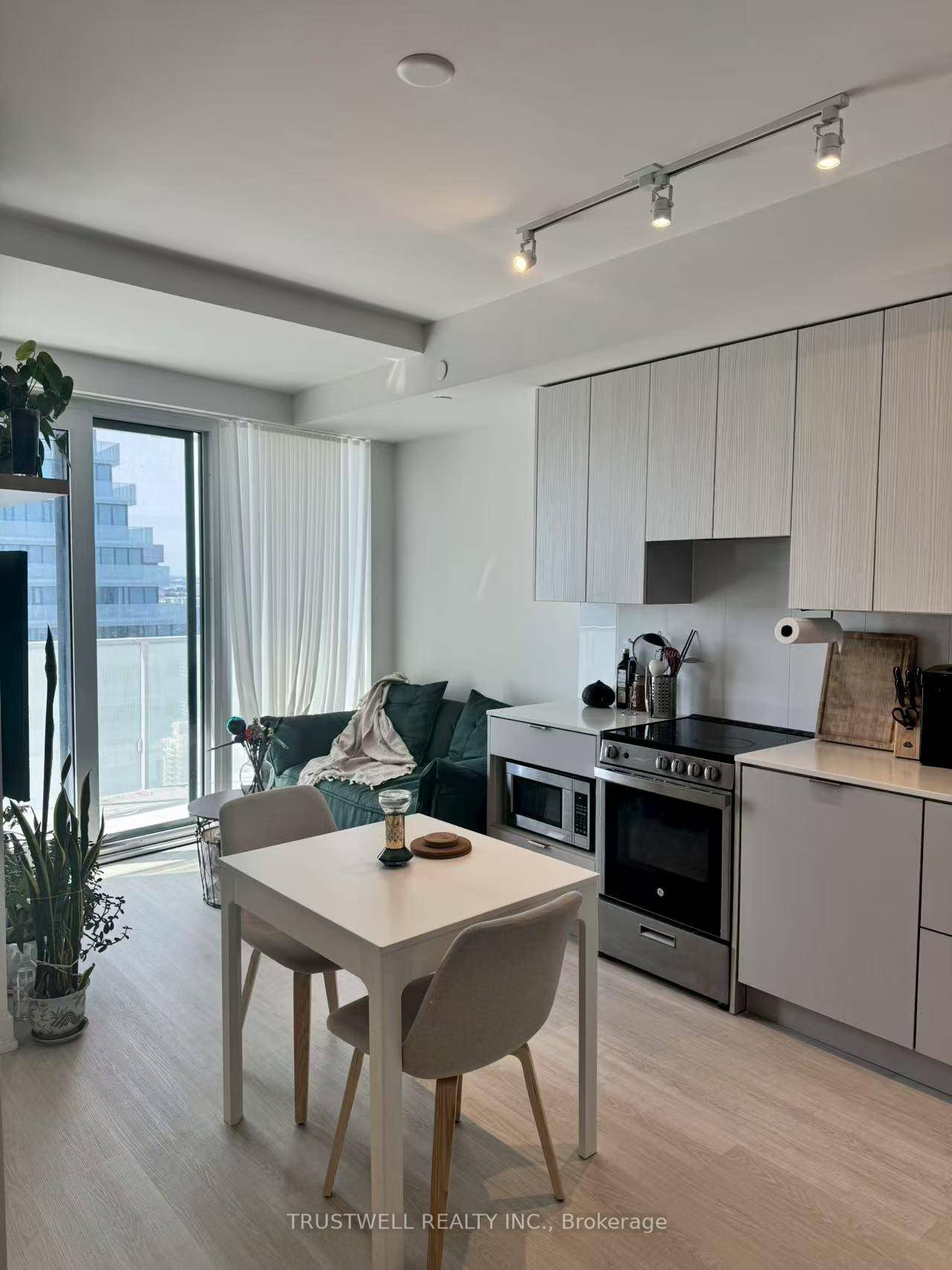 Luxury 2 Bedroom Media condo at M City2, featuring 9' smooth ceilings, laminate floors, and a bright open concept layout.