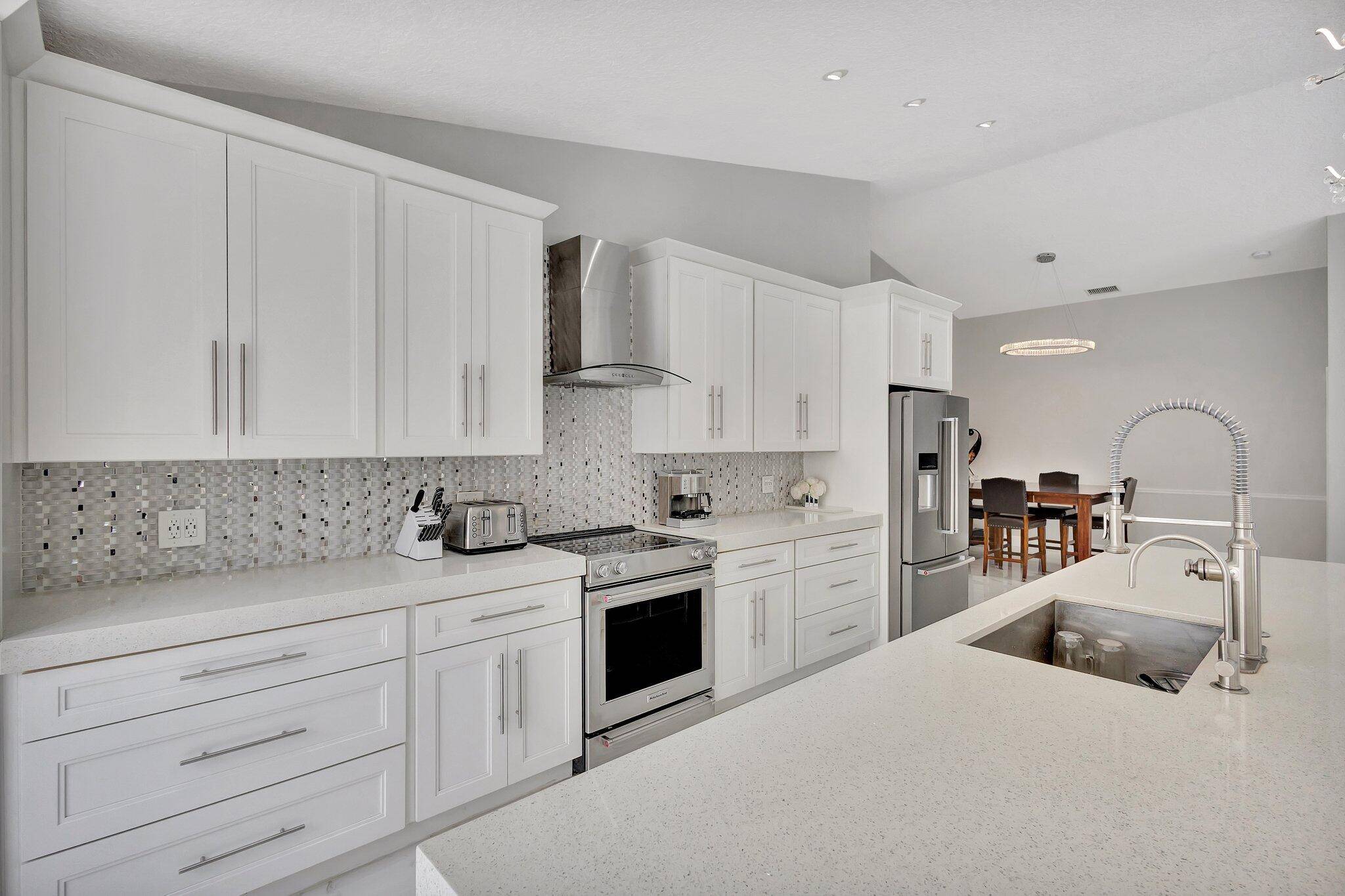 Welcome to this meticulously renovated 1 story single family pool home in the highly desirable community of Siena Oaks in Palm Beach Gardens.