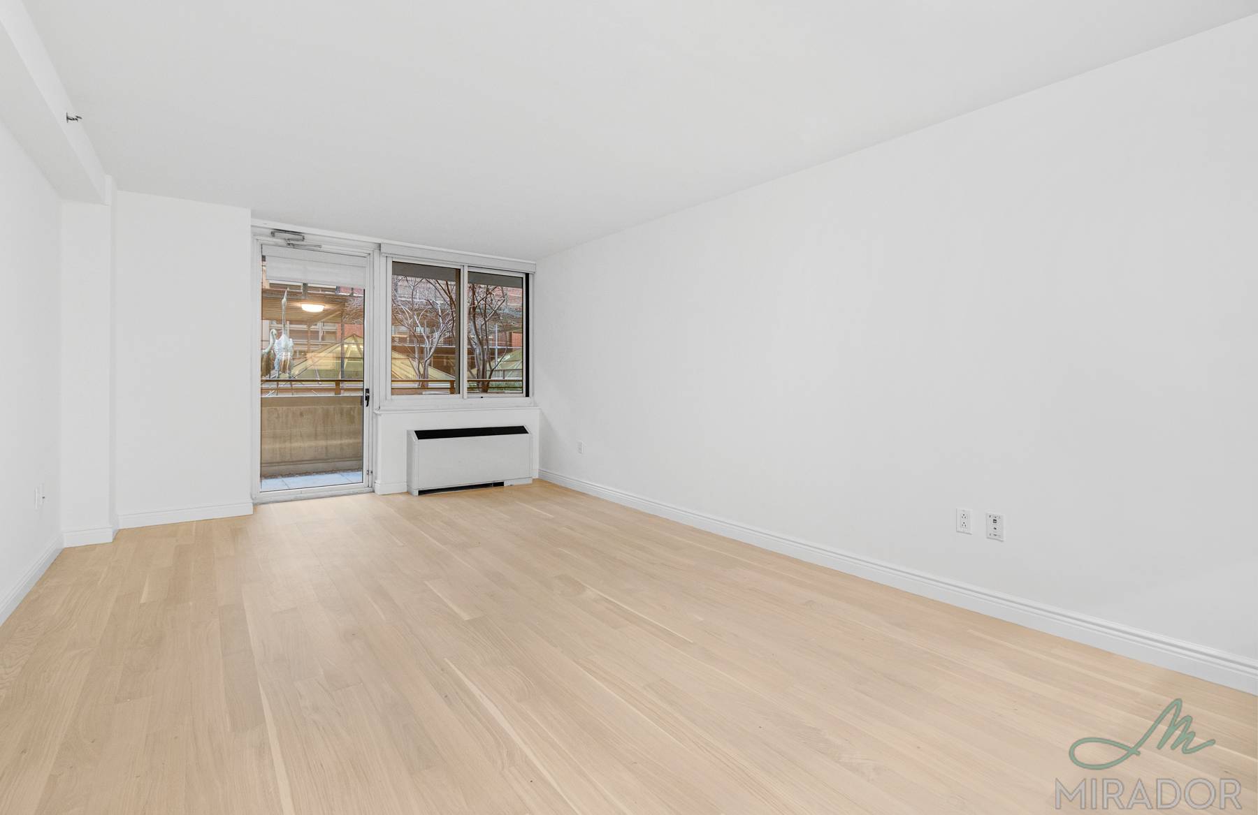 Beautiful two bedroom two bathroom home with a large private balcony overlooking the courtyard at The Caroline.