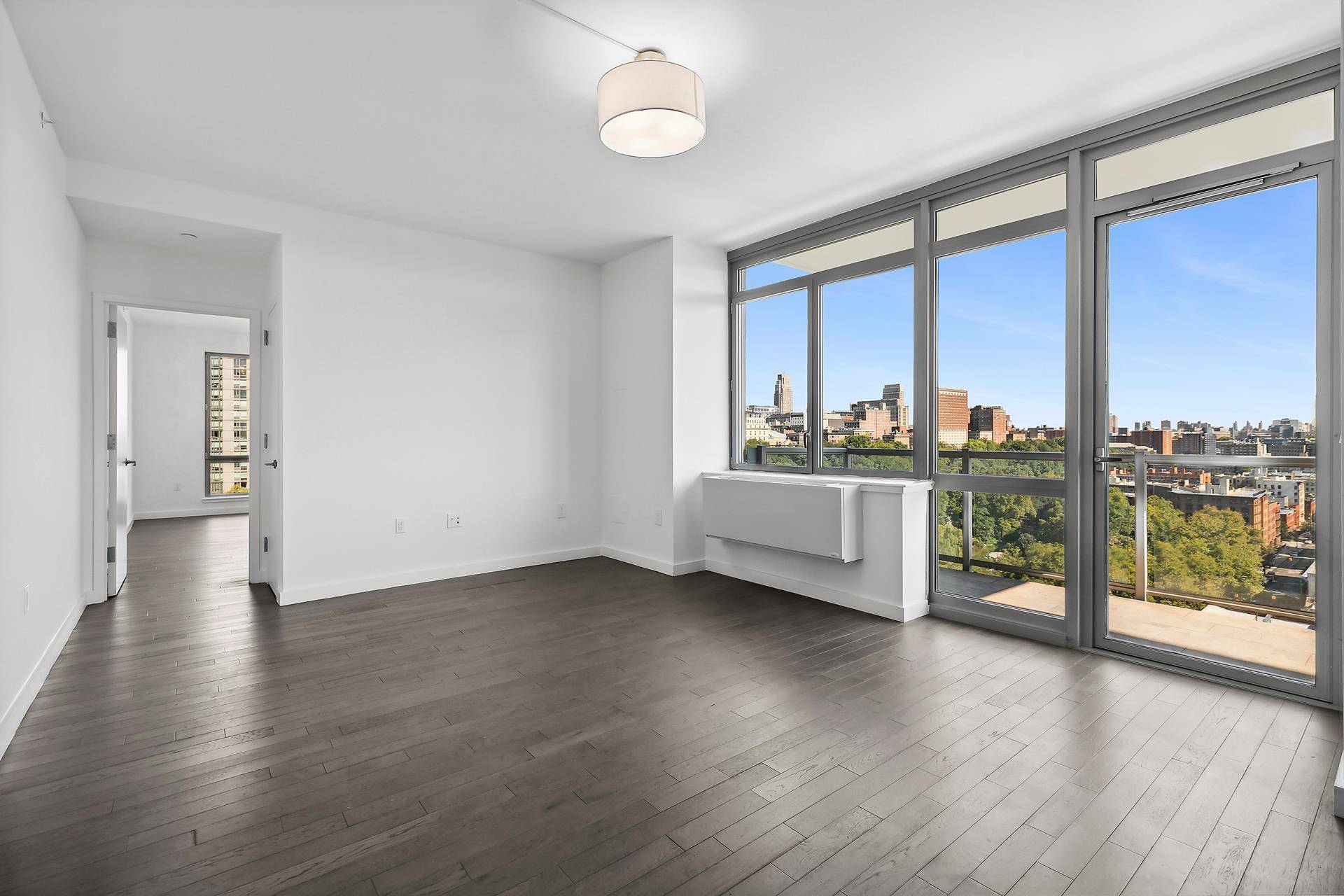 Nestled between the iconic Morningside Park and Central Park, this exceptional 2 bedroom, 2 bathroom apartment offers an unparalleled living experience with triple exposure to the East, North, and West.