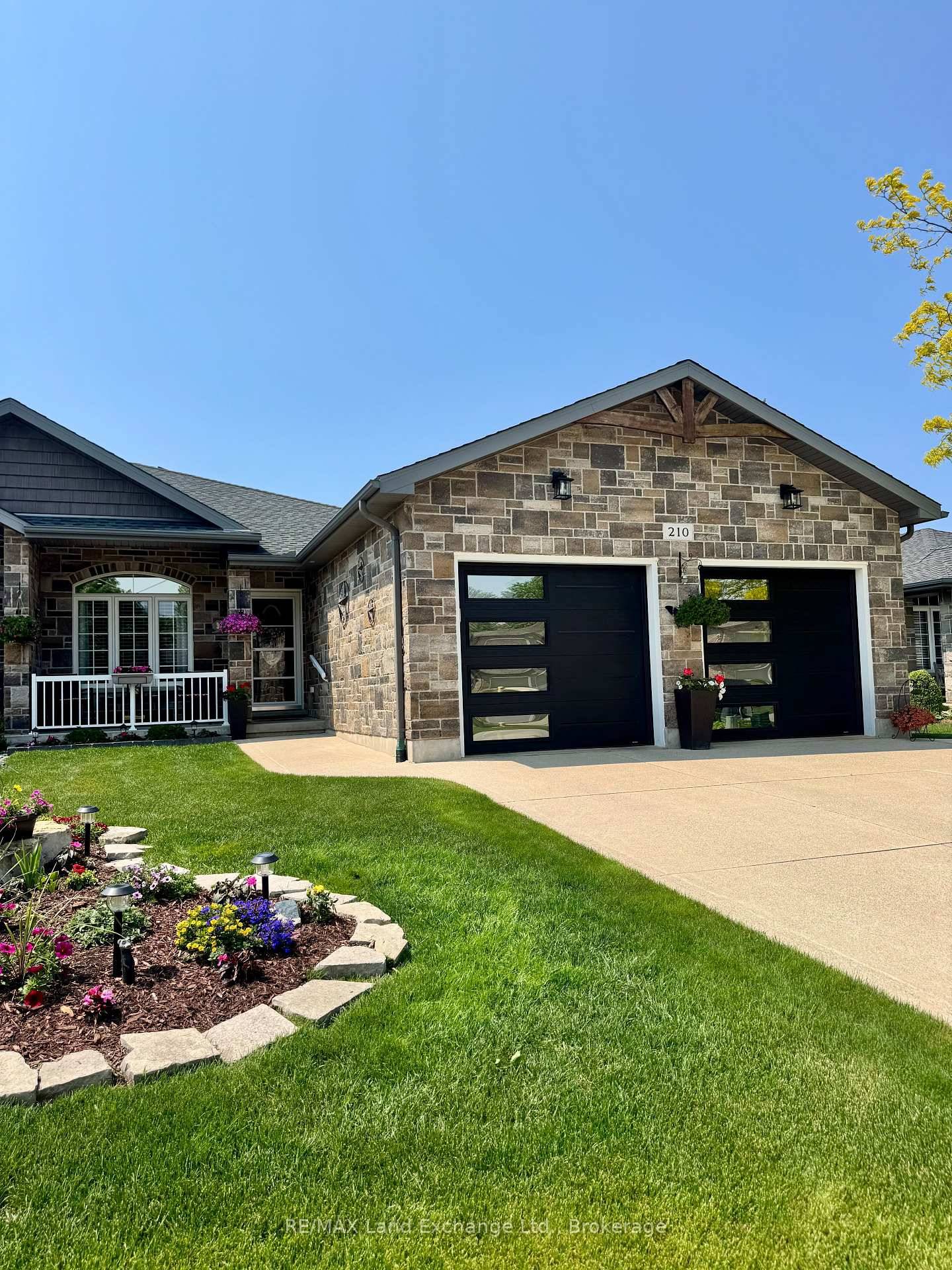 Immaculate freehold townhome at 210 Stickel Street in Port Elgin ; finished top to bottom.