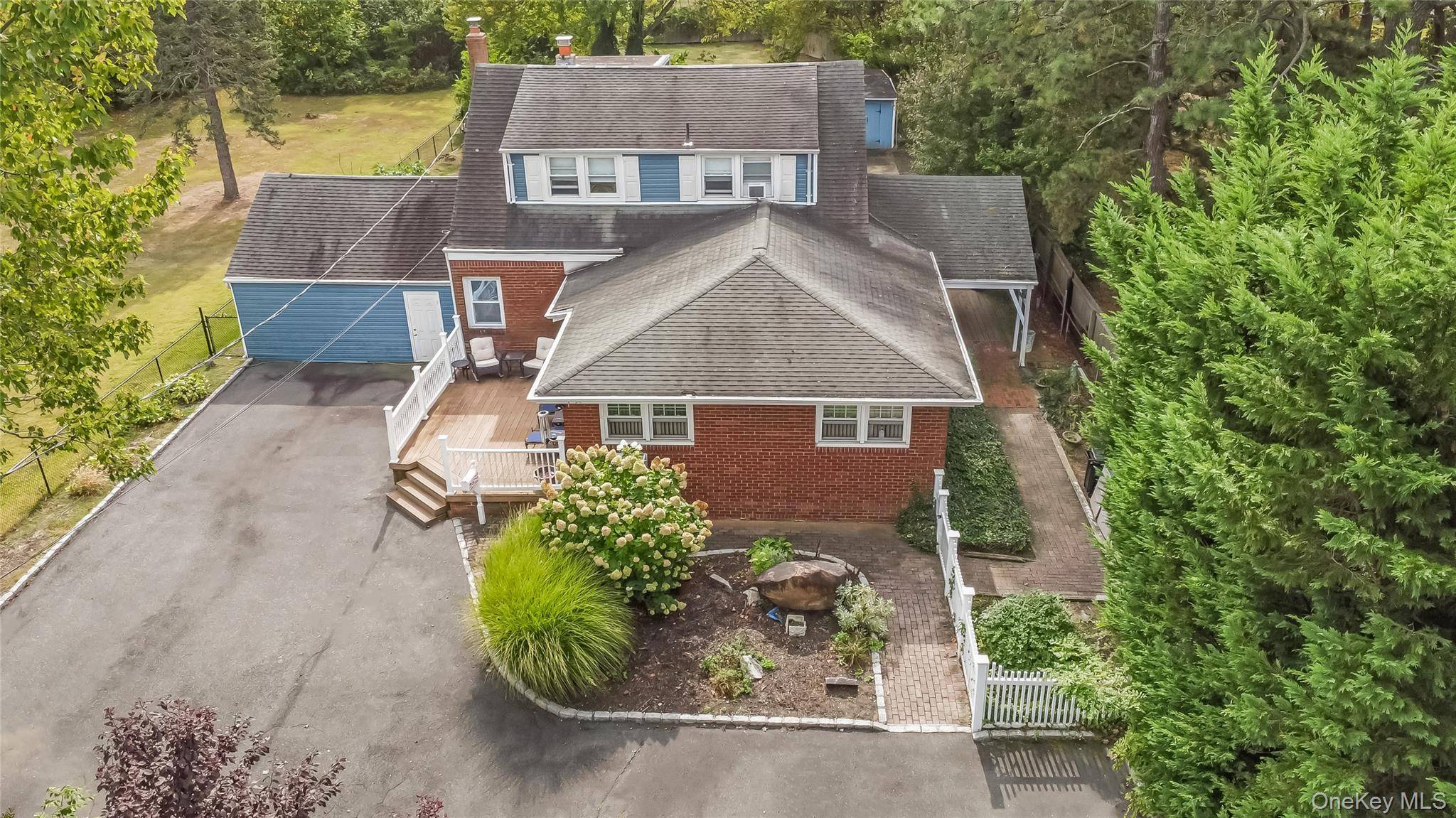 An Amazing 3400 sq. ft of flexible living with 3 separate entrances ideal for extended family and wonderful newly spacious renovated basement with stone fireplace and great living area.