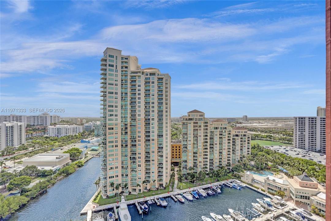 Handyman Special ! Located in the sought after, guard gated community of Hidden Bay in Aventura, this residence offers sweeping water and skyline views and an exceptional lifestyle opportunity.