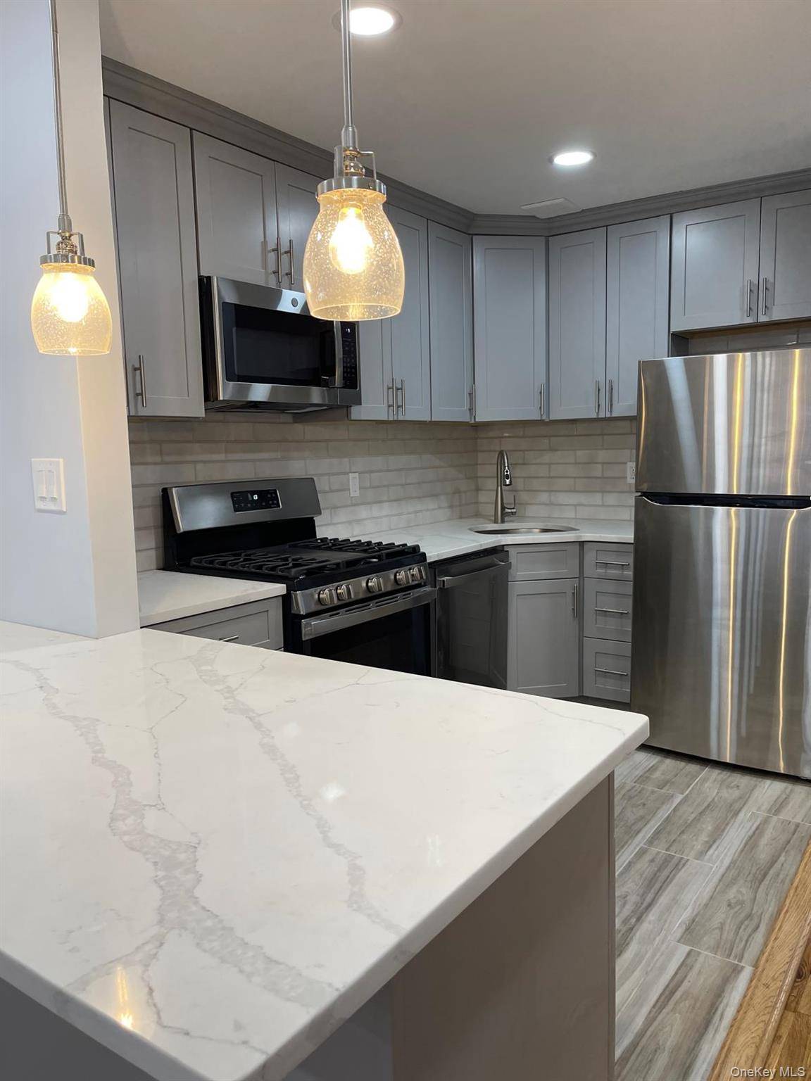 Immaculately Renovated 3 bed 2 bath unit in Bushwick Large Box Bedrooms with Closets Hardwood Floors Stainless Steel Appliances Granite Countertops Large Open Floor Plan with a Large Living Room ...