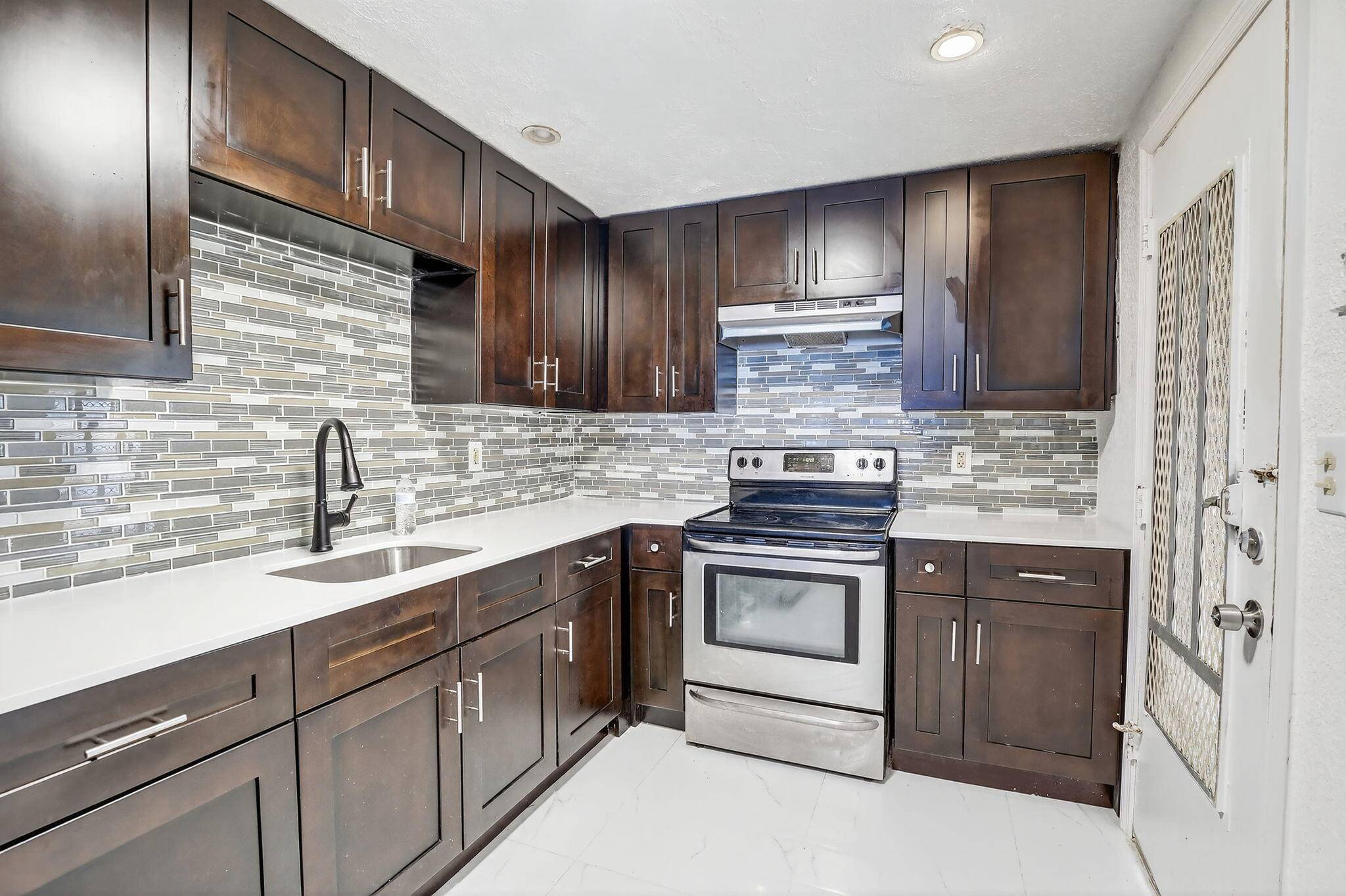 Welcome home to this beautifully updated first floor 2 bedroom, 1 bath condo !