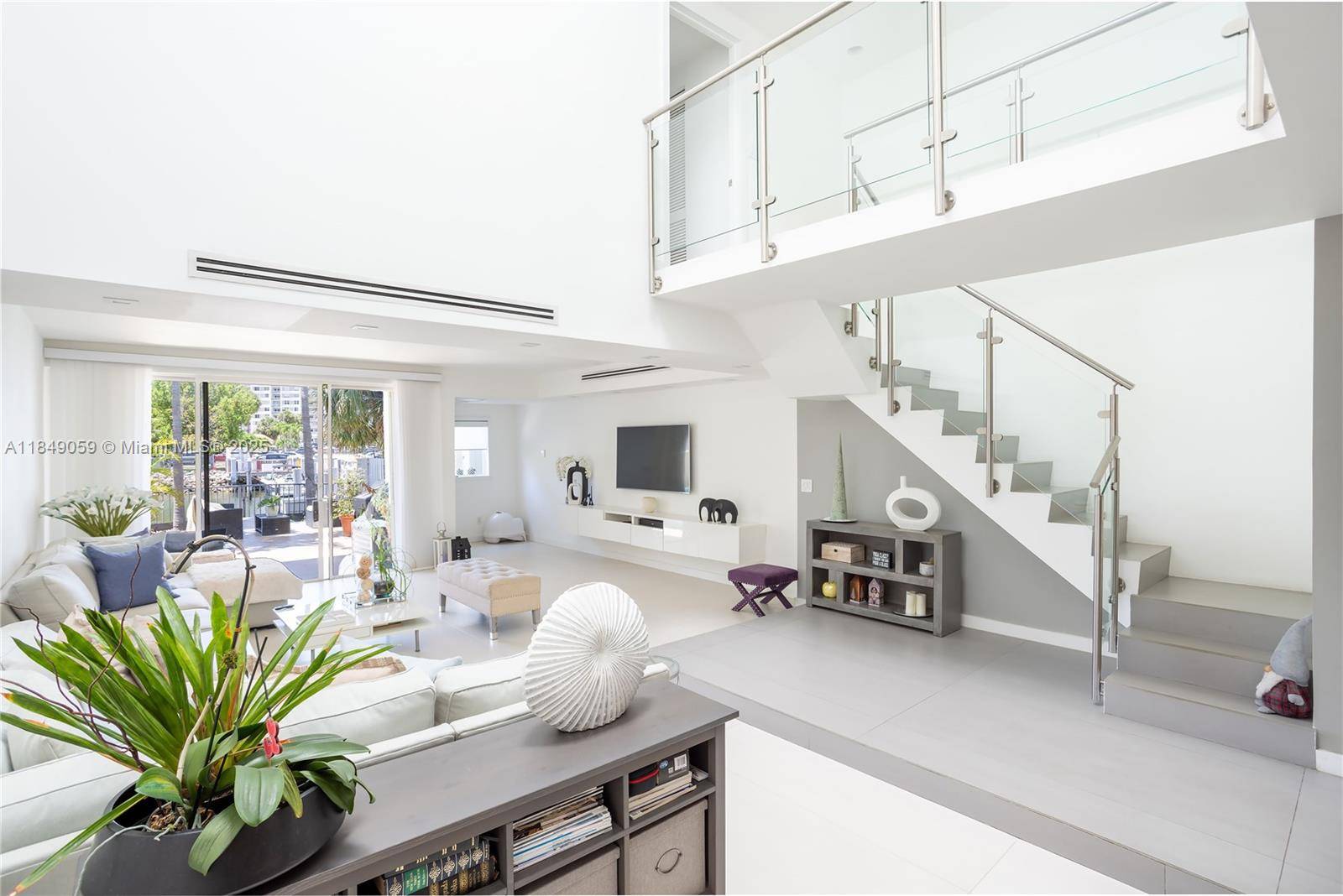 Rare opportunity to own the most affordable waterfront townhouse in the heart of luxurious Sunny Isles Beach surrounded by multi million dollar condos.
