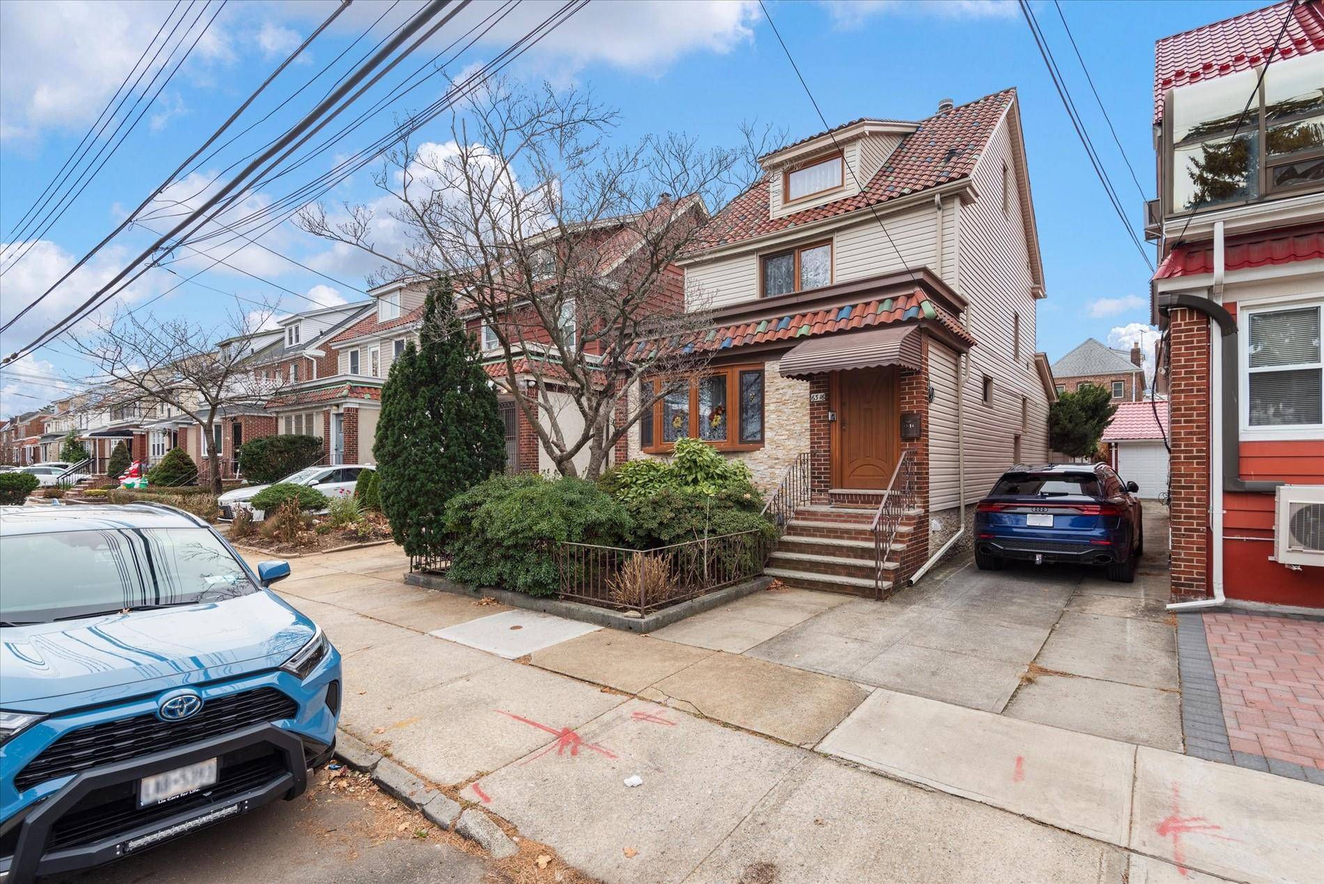 REAL MASTERPIECE Amazing Single Family TRIPLEX Situated On the Border Of Middle Village amp ; Rego Park.