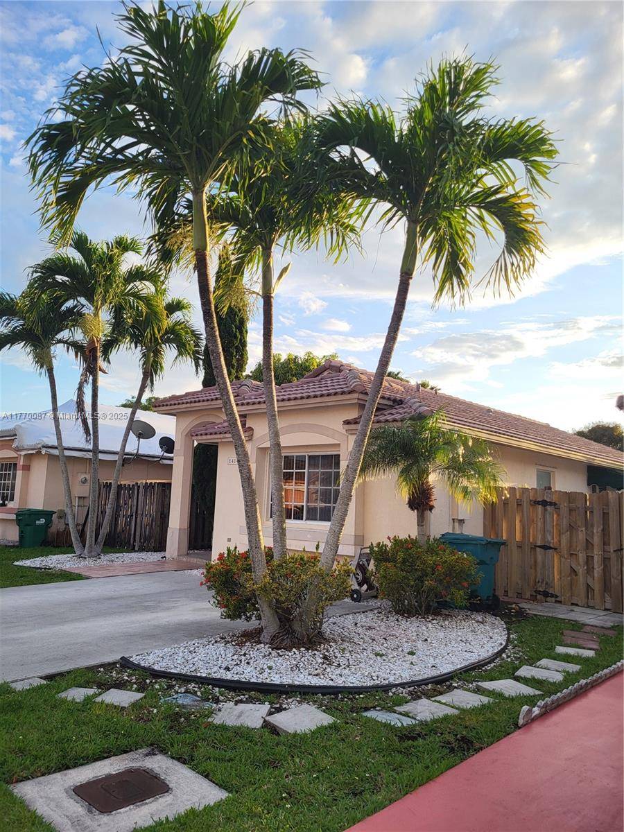 This 3 2 single story house is located in a gated community.