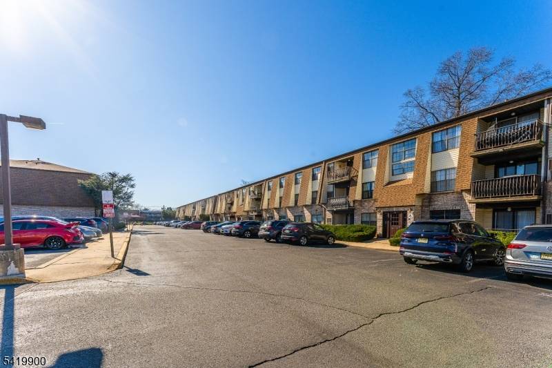 Confortable first floor unit features two spacious bedrooms, including a primary suite with its own full bath and a large walk in closet.