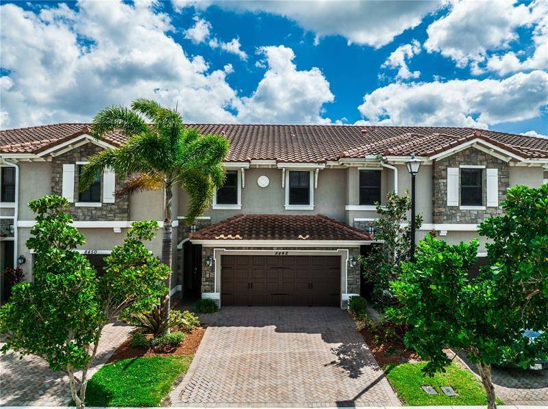 HIGHLY DESIRABLE 3 Bedroom, 2 1 2 bathroom 2 story townhome in Town Parc at Mira Lago, Parkland with WIDE WATER LAKE VIEWS and fenced in yard !