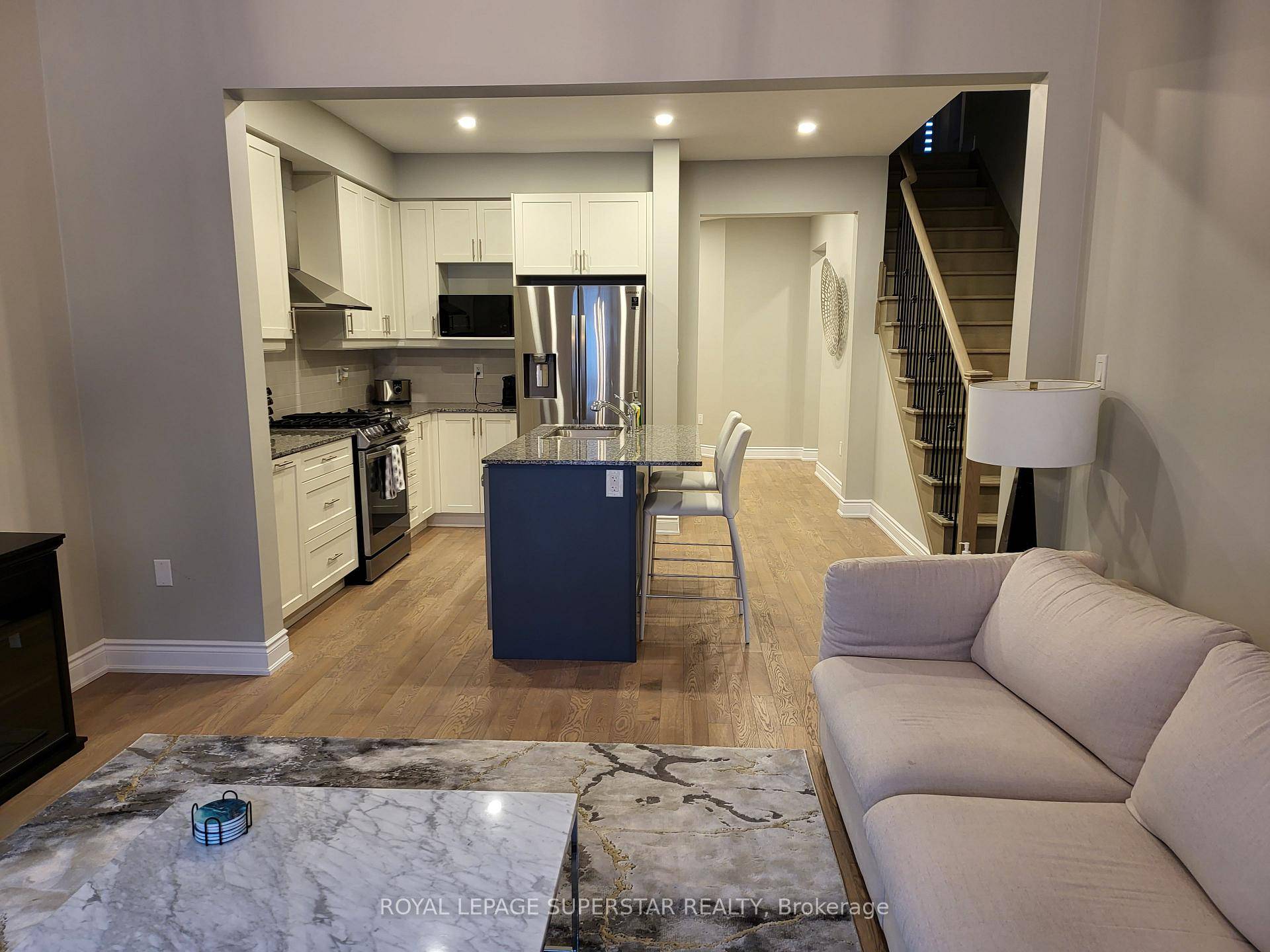 Welcome to 13 Eberhardt Dr, Wasaga Beach a beautifully designed 4 bedroom, 4 washroom, Double Car Garage executive townhome just minutes from the beach 2.