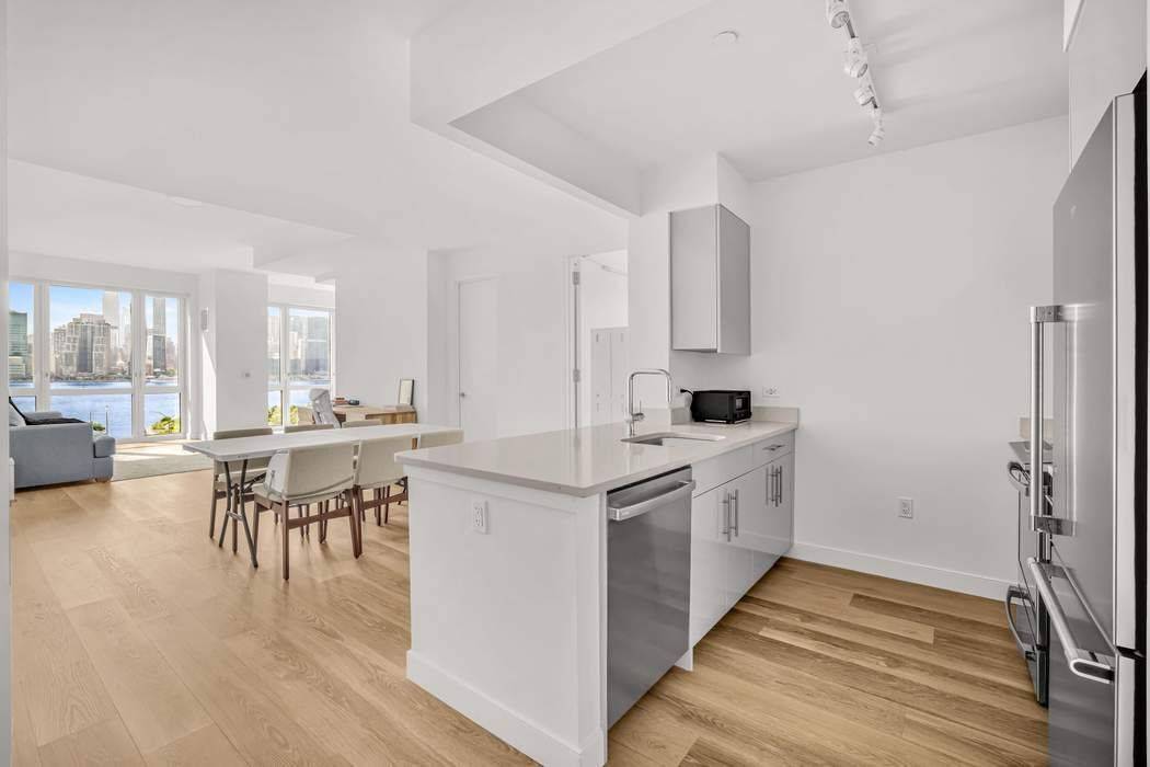 Lease assignment Current lease expires 2 28 26 Spacious 2 bedroom, 2 bath apartment with exceptional water and Manhattan Skyline views !