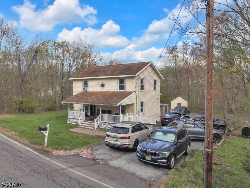 Opportunity meets space, versatility, and privacy in this expansive 5 bedroom, 3 full bath home set on a beautiful property backing to serene wooded surroundings.