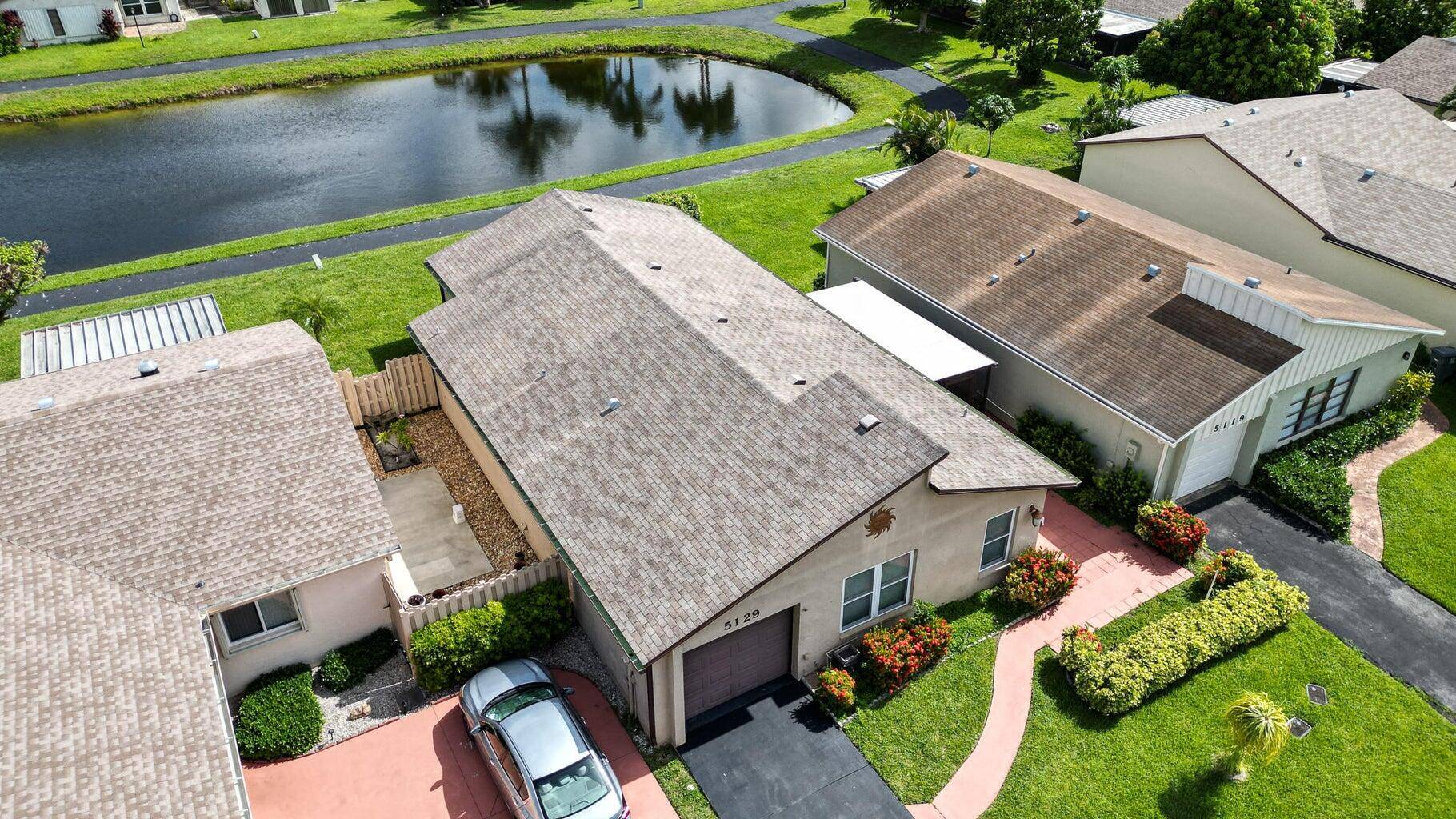 Welcome Home to Mirror Lakes, Lakefront Living at Its Finest !