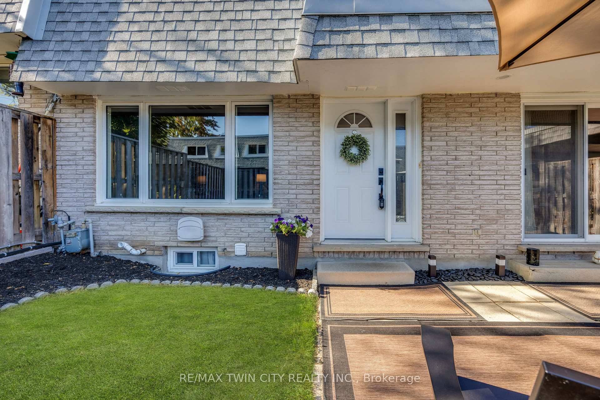 Welcome to 14 Williamsburg Road, Unit 54 A Beautifully Updated Townhome in the Heart of Kitcheners Williamsburg Community.