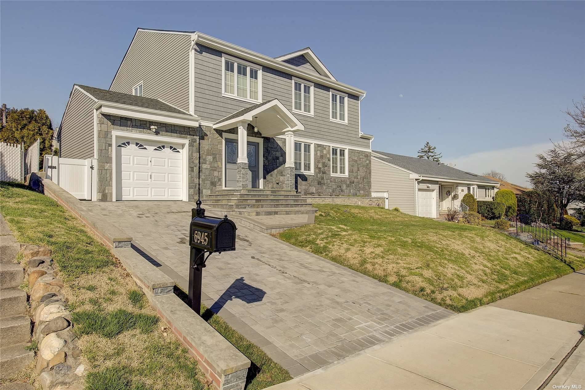 Welcome to 69 45 266th St, a stunning single family home located in the desirable neighborhood of Glen Oaks, a hidden gem.