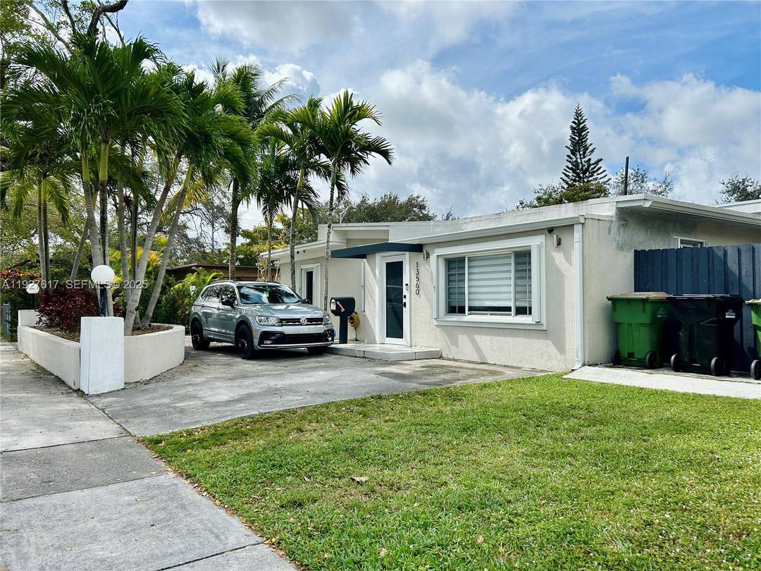 Beautiful amp ; big home tastefully renovated, excellent location 4 large bedrooms and 2 baths, a modern kitchen with stainless steel appliances, impact glass, hurricane shutters, beautiful floors throughout in ...