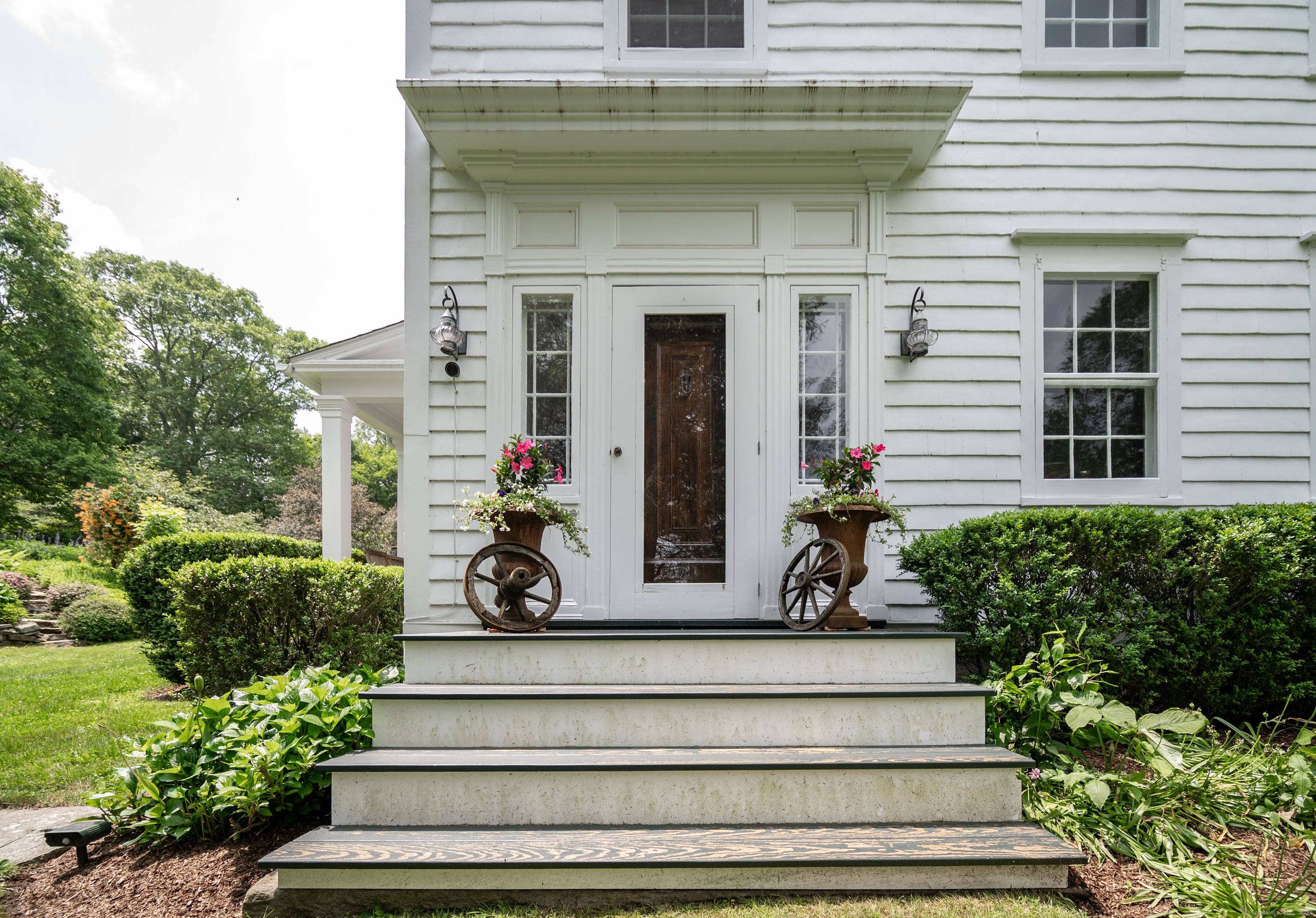 This charming 1870 antique home is pure perfection conveniently located in West Redding.