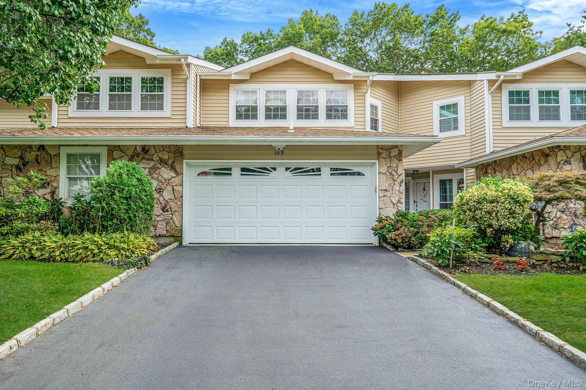 Welcome Home ! This two story townhouse is nestled in a gated community.