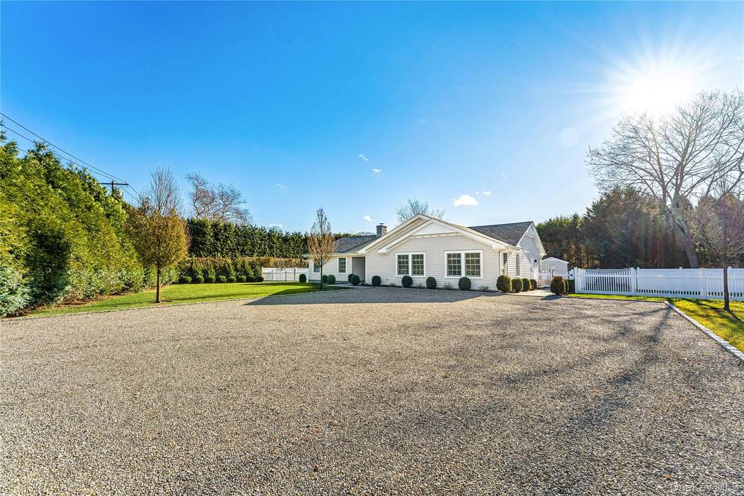 Beautifully renovated in 2023, this traditional Hamptons style three bedroom, three bath ranch offers 2, 590 square feet of refined single level living in Westhampton Beach.