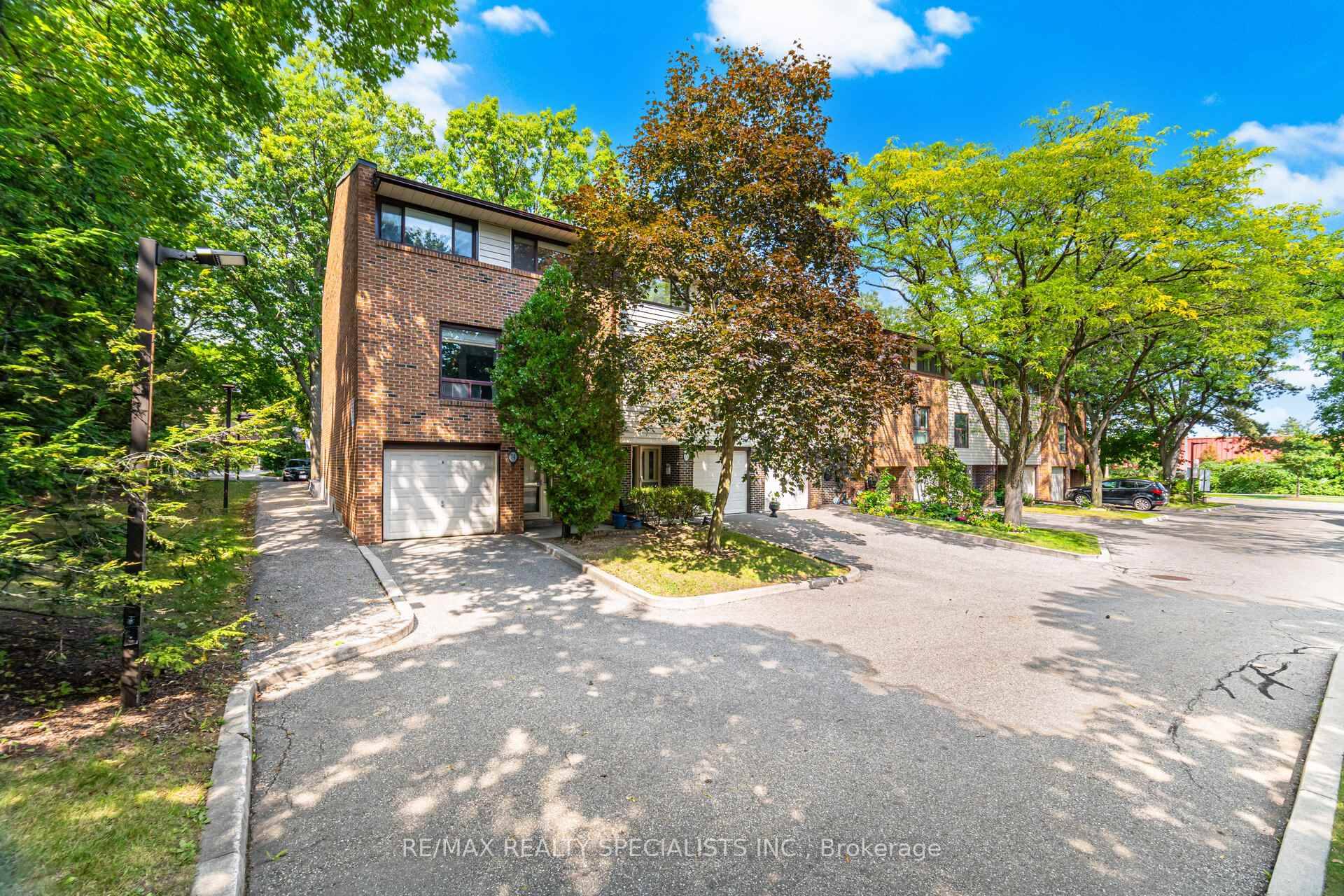This spacious end unit townhome is tucked into a quiet, tree lined enclave in one of Mississauga's most convenient locations.