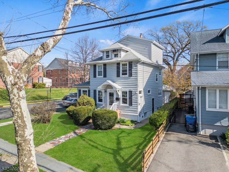 Beautiful 4 bedroom, 3 bath side hall Colonial nestled on a desirable corner lot in Rutherford.