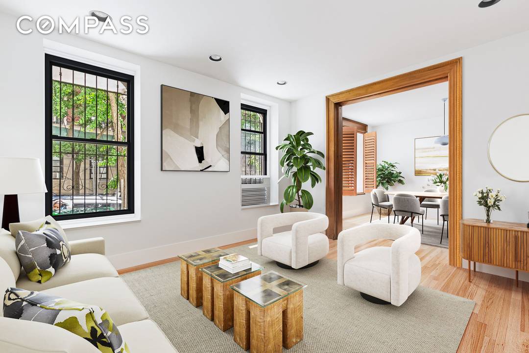An expansive prewar duplex that lives like a townhouse, with four bedrooms, two full bathrooms and a powder room, a gracious separate dining room, and a private garden that brings ...
