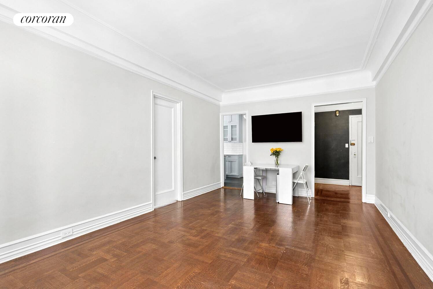 LARGE ONE BEDROOM in PRE WAR FULL SERVICE BUILDING with NO BOARD INTERIVEW Welcome to this graciously proportioned prewar one bedroom offering a blend of traditional details and modern updates.
