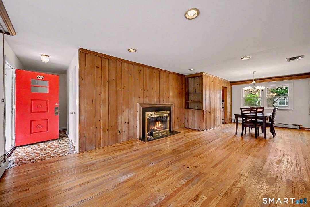 Tucked away on a quiet, tree lined street, this home at 54 Merriman Road presents a great opportunity to create your own vision.