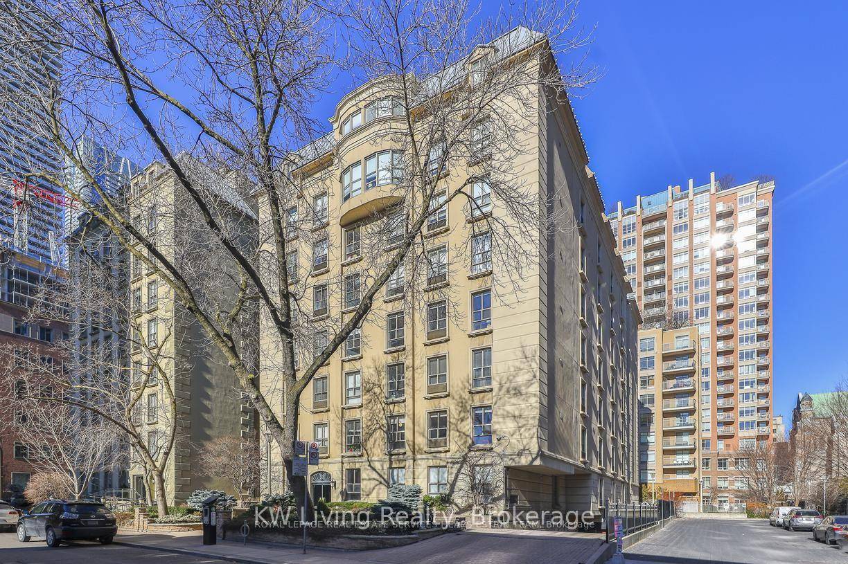 Low Rise Building On A Tree Lined Street !