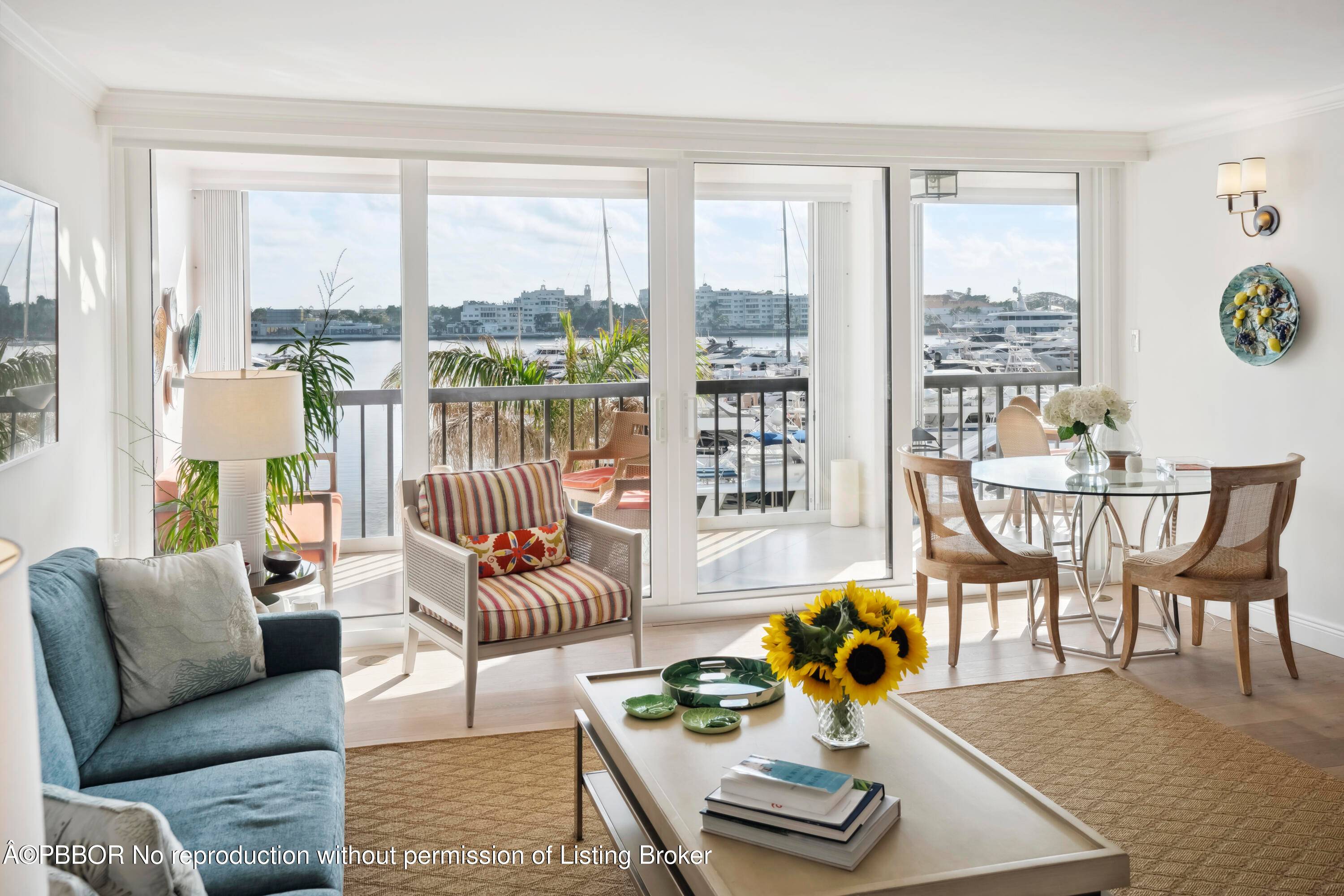 Beautifully updated apartment with stunning views across the Palm Harbor Marina and Intracoastal to The Breakers, Flagler Mansion and Palm Beach island.