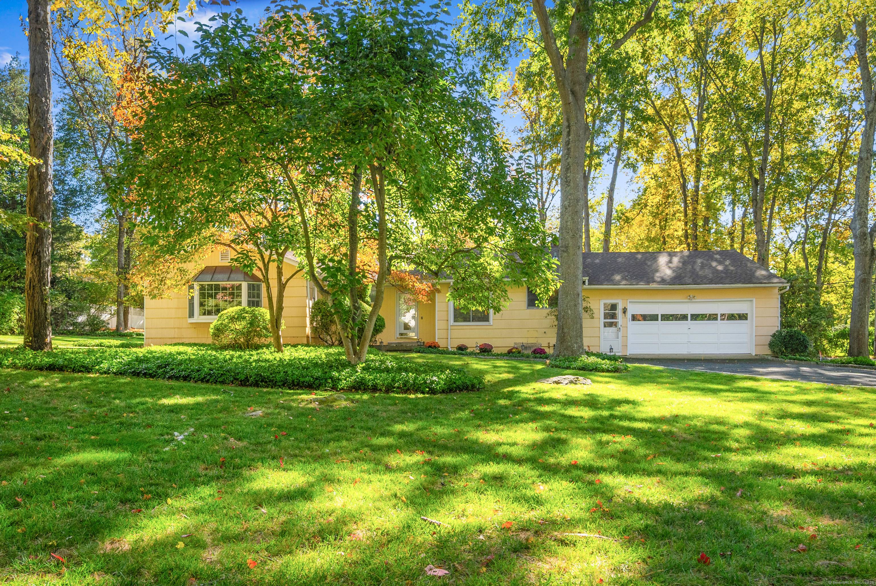 Nestled on 1 beautifully landscaped acre, this charming 3 bed, 2 bath one level home is a perfect blend of charm and modern design.