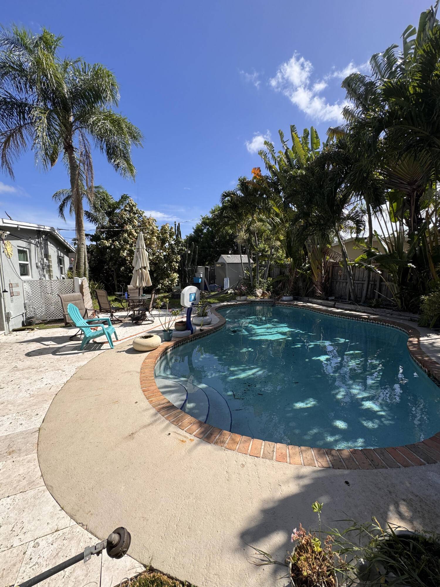 Enjoy South Florida living in this charming 2 bedroom, 1.