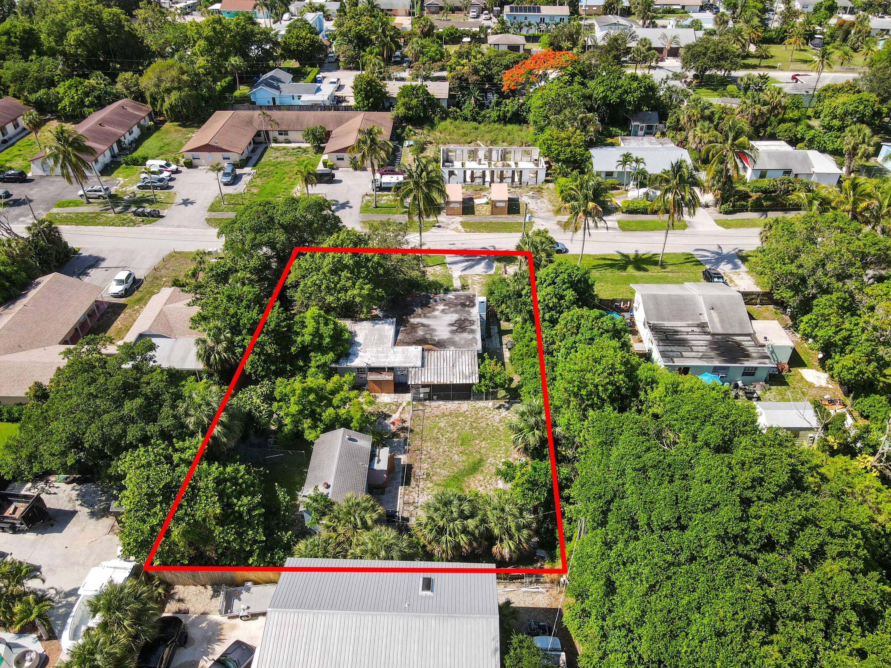 Unlock incredible investment potential with this fantastic 3 family triplex, perfectly situated on an expansive double lot spanning 14, 003 sq ft.