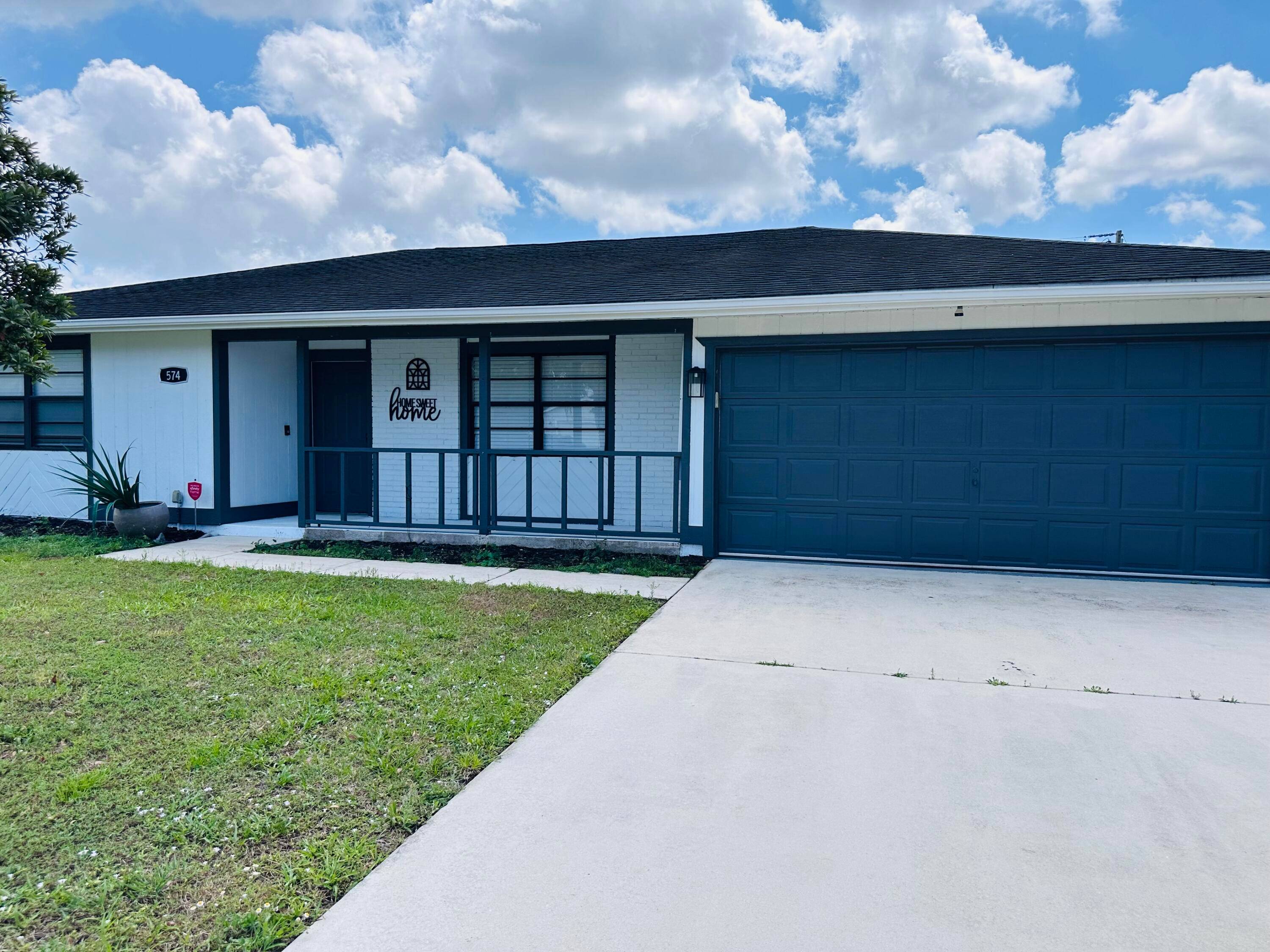 Beautiful single family pool home in the heart of Port St Lucie with updated 3 bedroom 2 full bath 2 car garage.