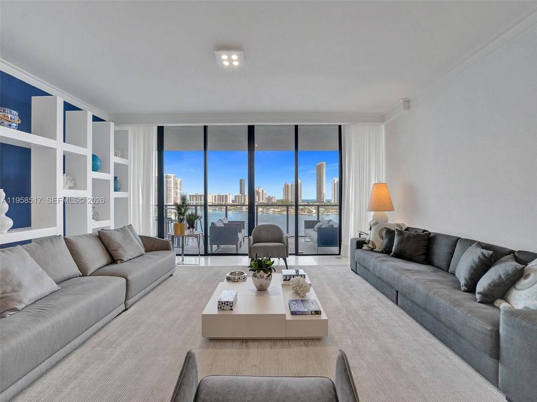 Exquisite, fully furnished, move in ready residence located on an exclusive private island, offering breathtaking ocean, Intracoastal, and city skyline views.